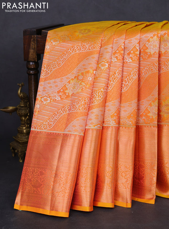 Pure kanchipuram silk saree dual shade of yellow with allover zari woven brocade weaves and rich zari woven border