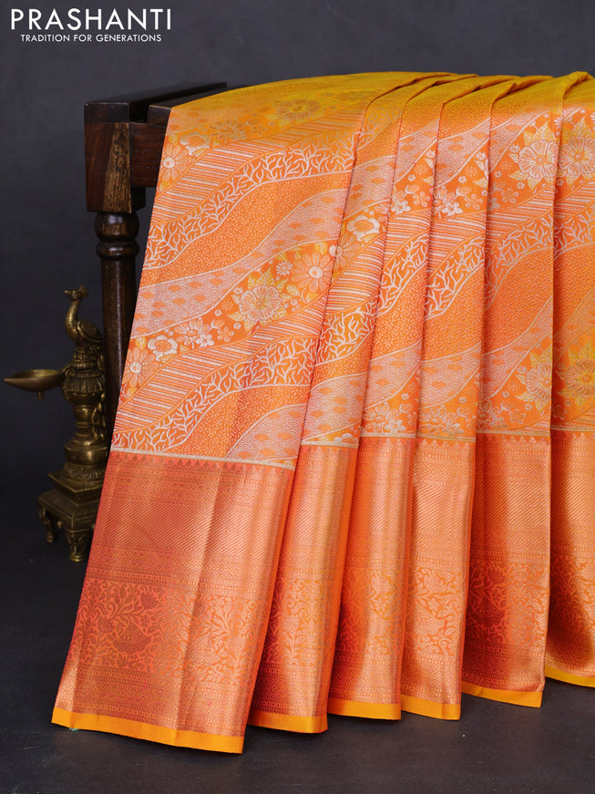 Pure kanchipuram silk saree dual shade of yellow with allover zari woven brocade weaves and rich zari woven border