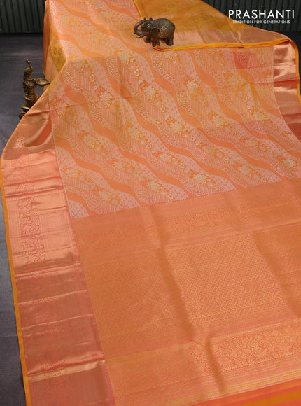 Pure kanchipuram silk saree dual shade of yellow with allover zari woven brocade weaves and rich zari woven border