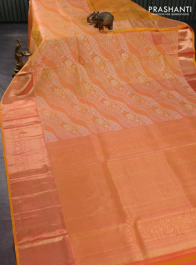 Pure kanchipuram silk saree dual shade of yellow with allover zari woven brocade weaves and rich zari woven border