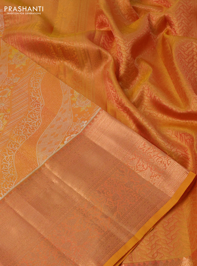 Pure kanchipuram silk saree dual shade of yellow with allover zari woven brocade weaves and rich zari woven border