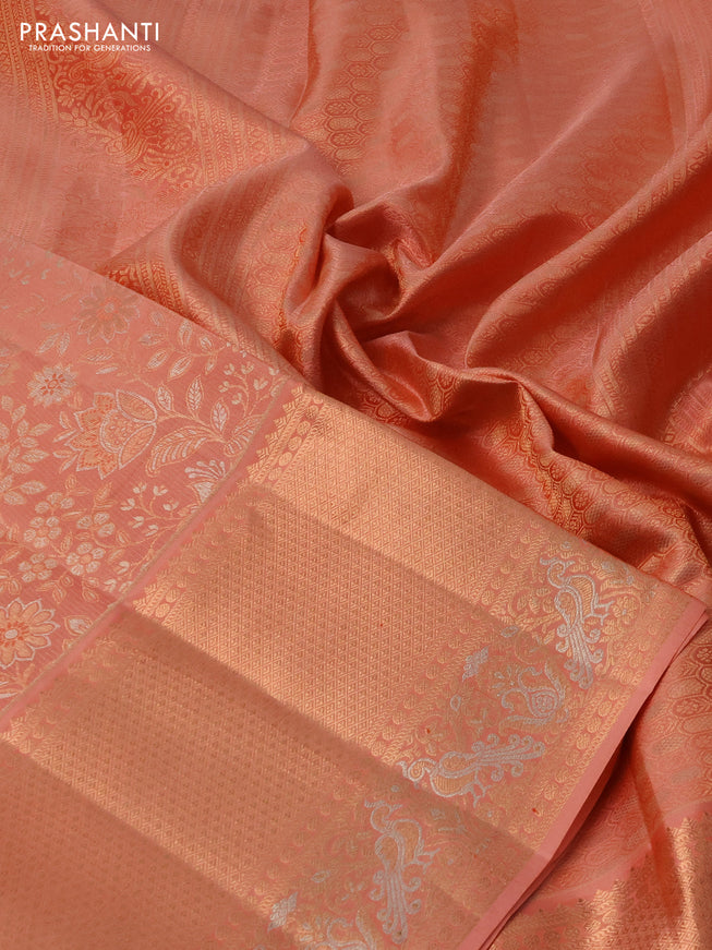 Pure kanchipuram silk saree pastel peach with allover zari woven floral brocade weaves and rich zari woven border