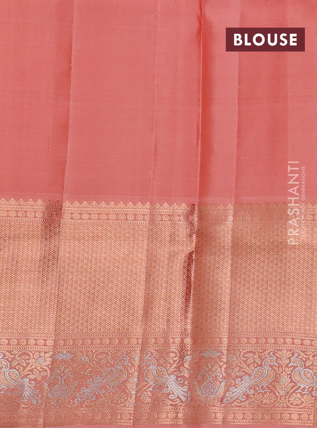 Pure kanchipuram silk saree pastel peach with allover zari woven floral brocade weaves and rich zari woven border
