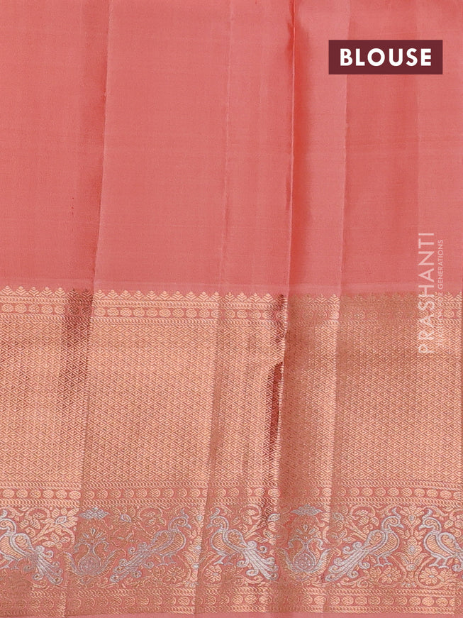 Pure kanchipuram silk saree pastel peach with allover zari woven floral brocade weaves and rich zari woven border