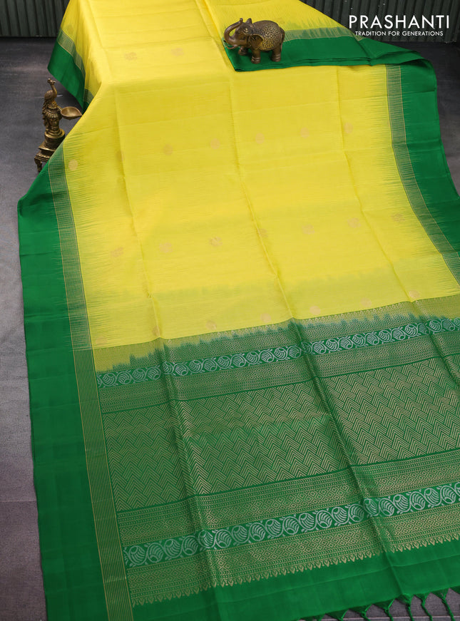 Pure soft silk saree lime yellow and green with allover zari weaves and zari woven simple border