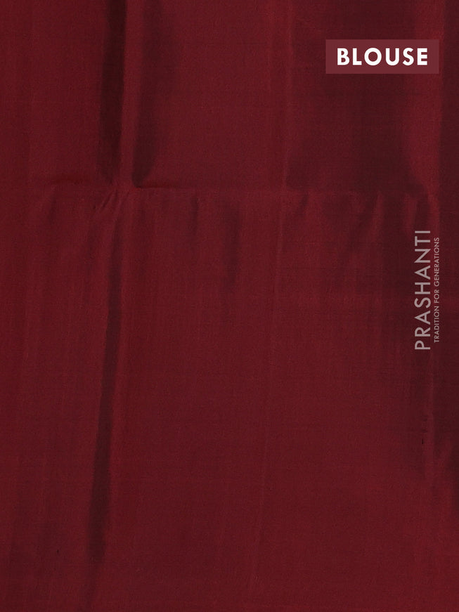 Pure soft silk saree maroon with allover zari woven buttas and rich zari woven border