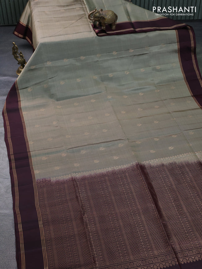 Pure soft silk saree grey and brown with allover zari woven buttas and rettapet zari woven border
