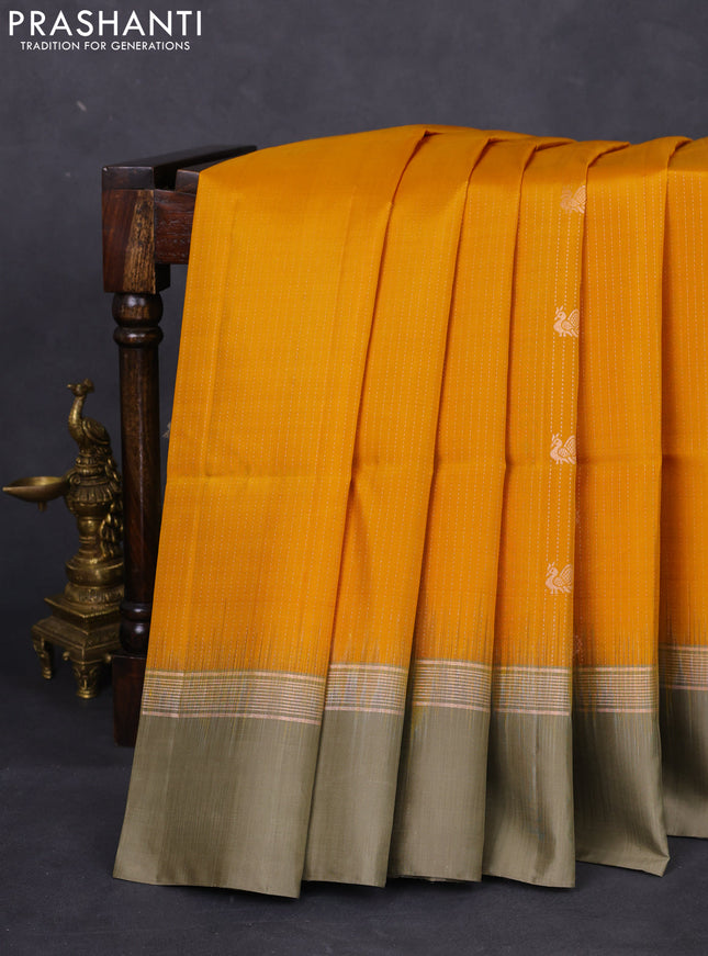 Pure soft silk saree mustard yellow and elaichi green with allover zari weaves & buttas and zari woven simple border