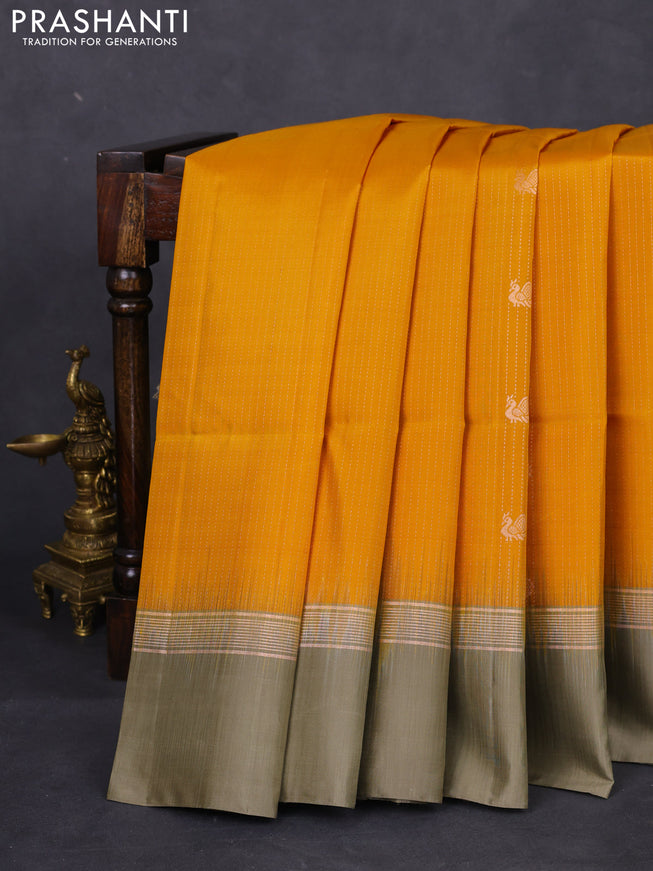 Pure soft silk saree mustard yellow and elaichi green with allover zari weaves & buttas and zari woven simple border