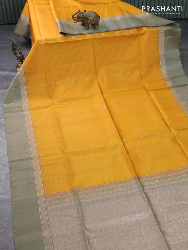 Pure soft silk saree mustard yellow and elaichi green with allover zari weaves & buttas and zari woven simple border