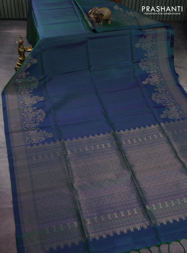 Pure soft silk saree dual shade of bluish green with allover zari weaves and rich zari woven border