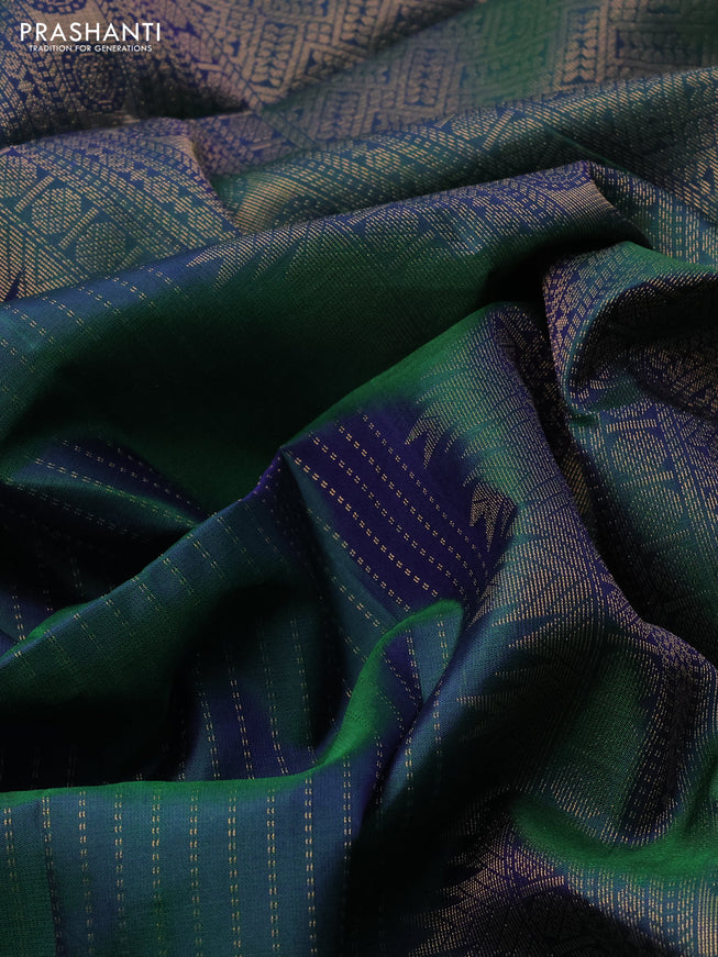Pure soft silk saree dual shade of bluish green with allover zari weaves and rich zari woven border