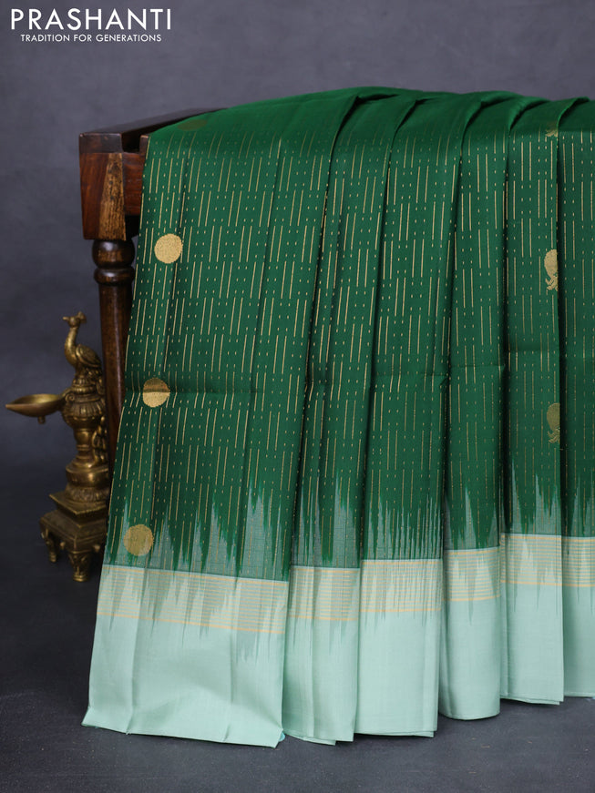 Pure soft silk saree green and pastel green with allover zari weaves and zari woven border