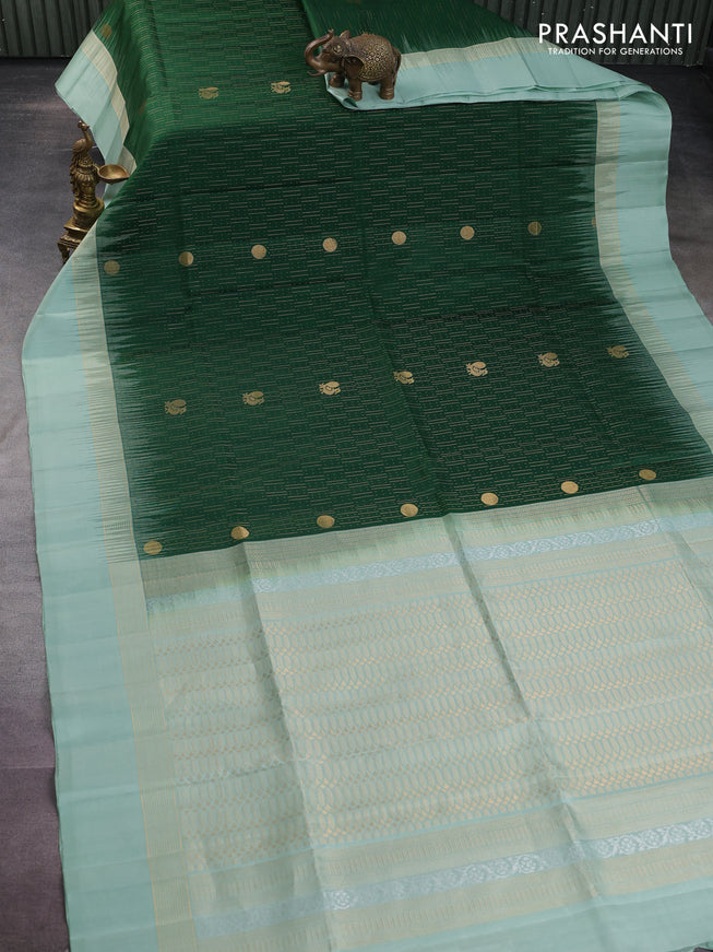 Pure soft silk saree green and pastel green with allover zari weaves and zari woven border