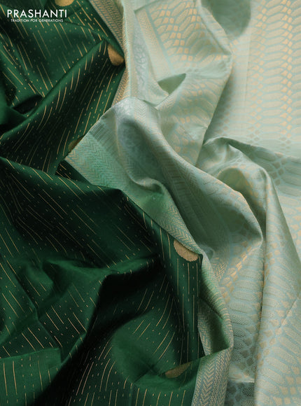 Pure soft silk saree green and pastel green with allover zari weaves and zari woven border