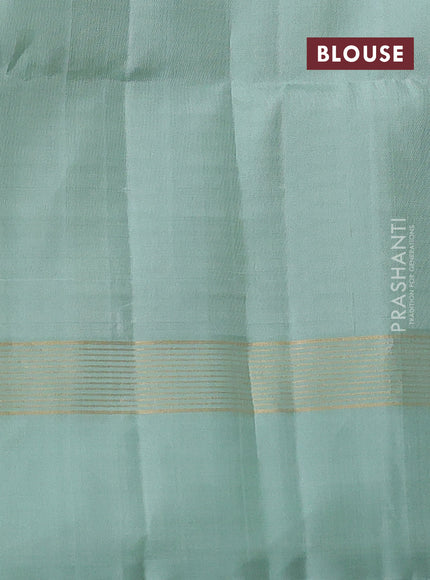 Pure soft silk saree green and pastel green with allover zari weaves and zari woven border
