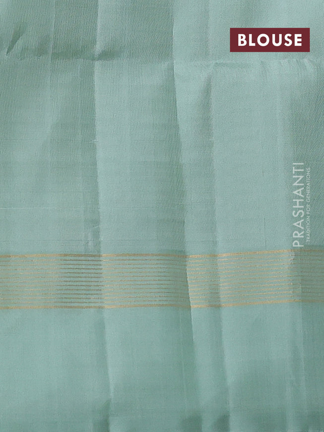Pure soft silk saree green and pastel green with allover zari weaves and zari woven border