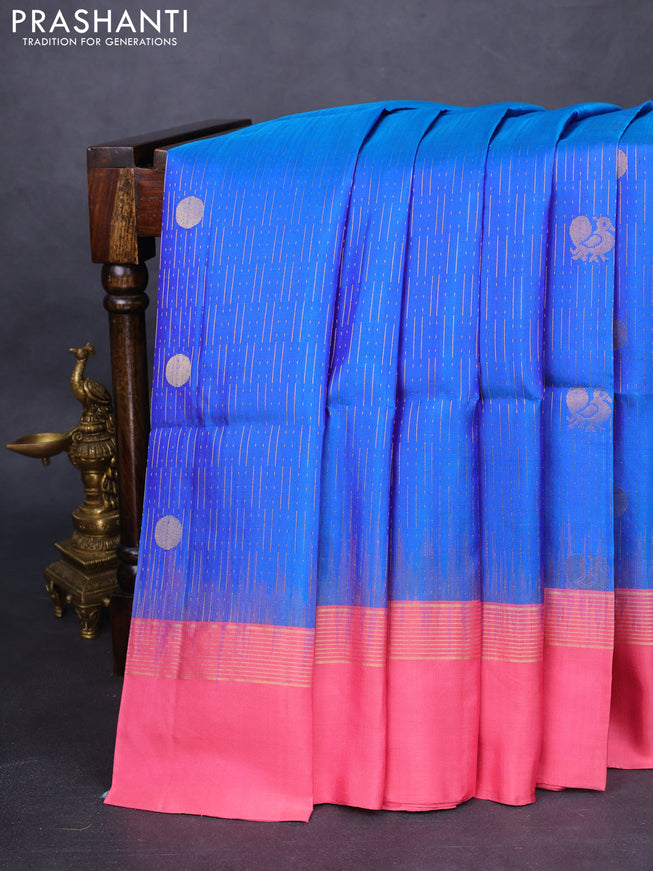 Pure soft silk saree blue and peach pink with allover zari weaves and zari woven border
