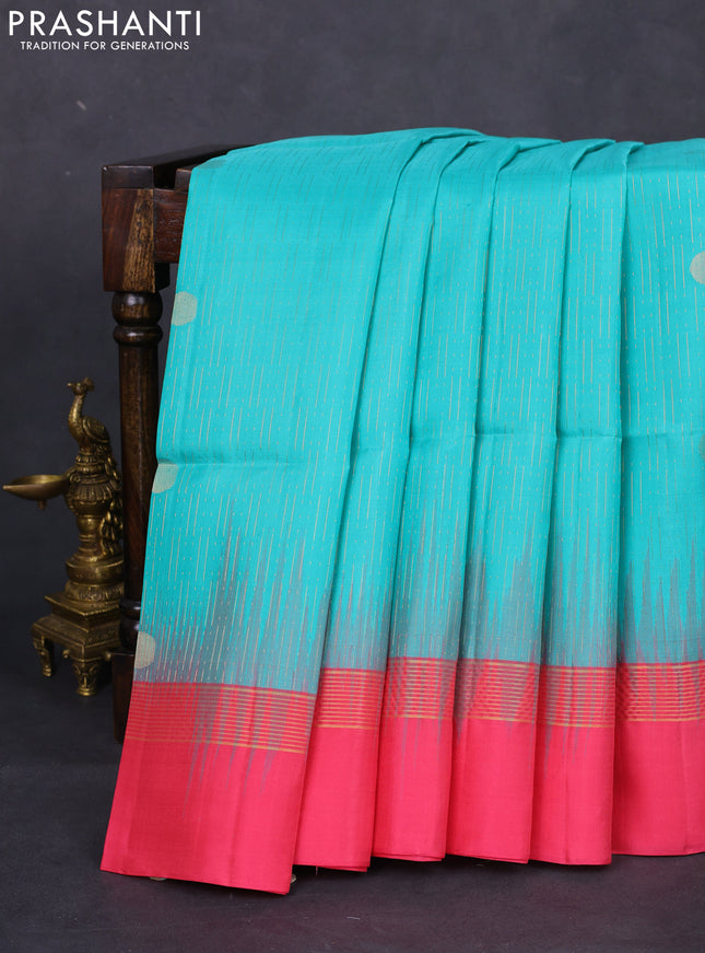Pure soft silk saree teal green and pink with allover zari weaves and zari woven simple border