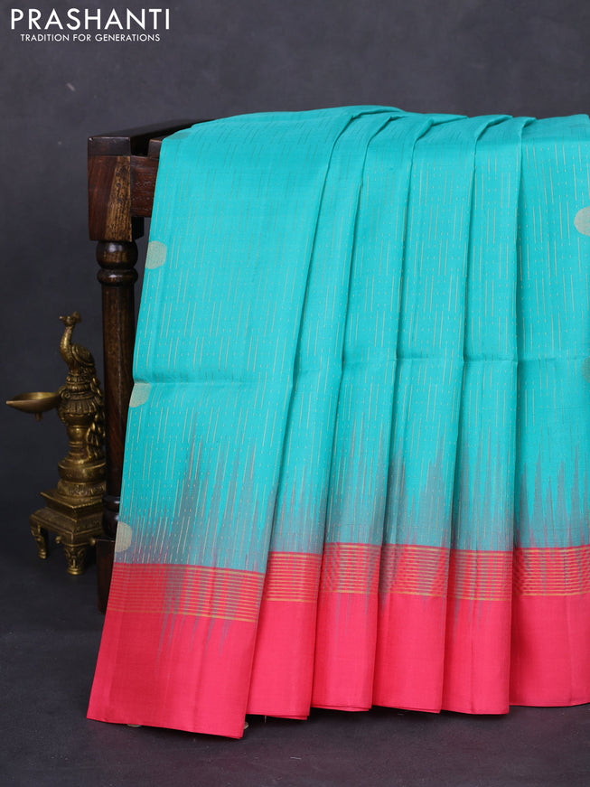 Pure soft silk saree teal green and pink with allover zari weaves and zari woven simple border