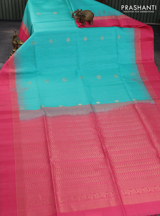 Pure soft silk saree teal green and pink with allover zari weaves and zari woven simple border