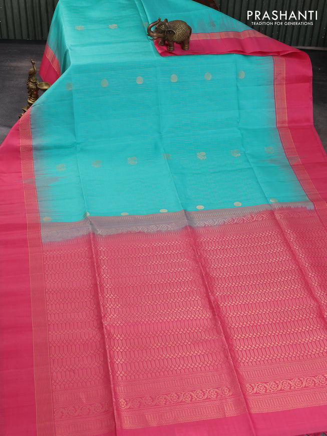 Pure soft silk saree teal green and pink with allover zari weaves and zari woven simple border