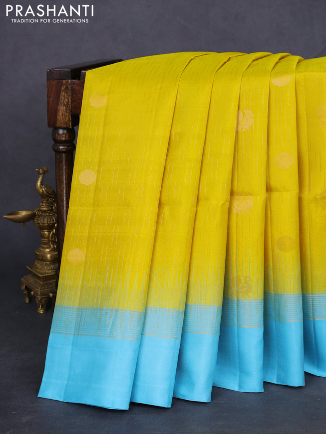 Pure soft silk saree lime yellow and light blue with allover zari weaves and zari woven simple border