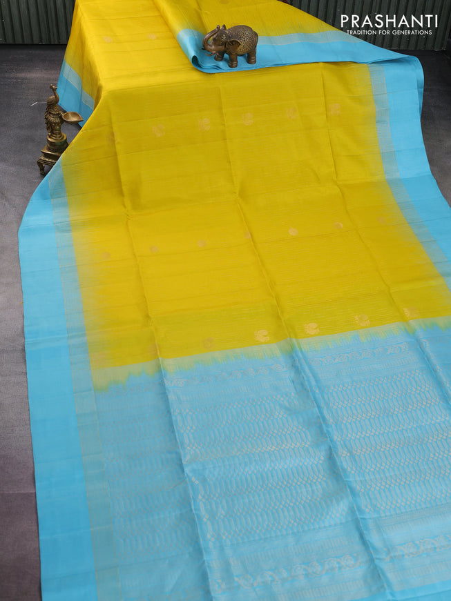 Pure soft silk saree lime yellow and light blue with allover zari weaves and zari woven simple border