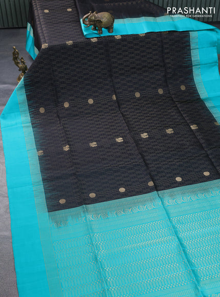 Pure soft silk saree black and teal green with allover zari weaves and zari woven simple border