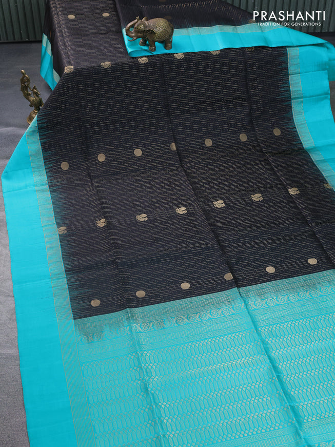 Pure soft silk saree black and teal green with allover zari weaves and zari woven simple border