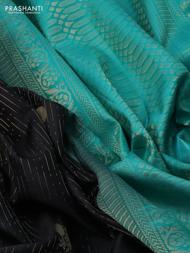 Pure soft silk saree black and teal green with allover zari weaves and zari woven simple border