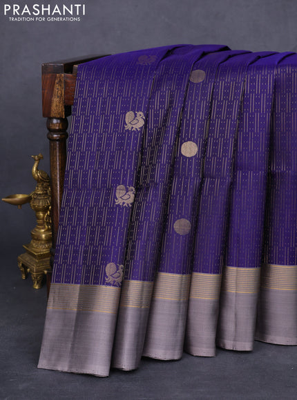 Pure soft silk saree blue and grey with allover zari weaves and zari woven simple border