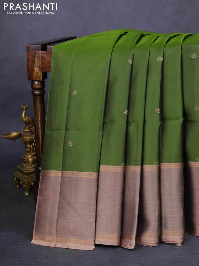 Pure soft silk saree sap green and pastel brown with zari woven floral buttas and rettapet zari woven border