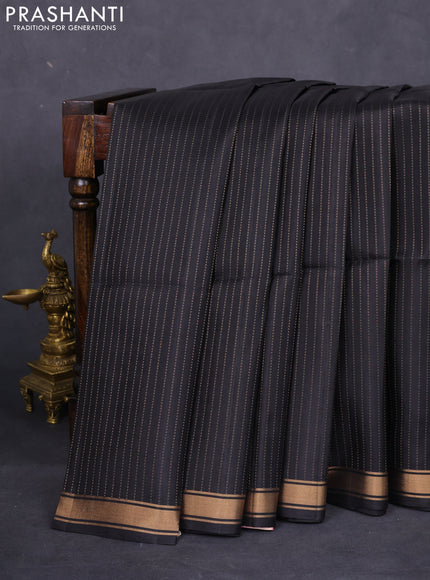 Pure soft silk saree black and pastel pink with allover zari weaves and zari woven border