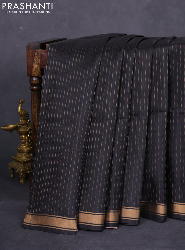 Pure soft silk saree black and pastel pink with allover zari weaves and zari woven border