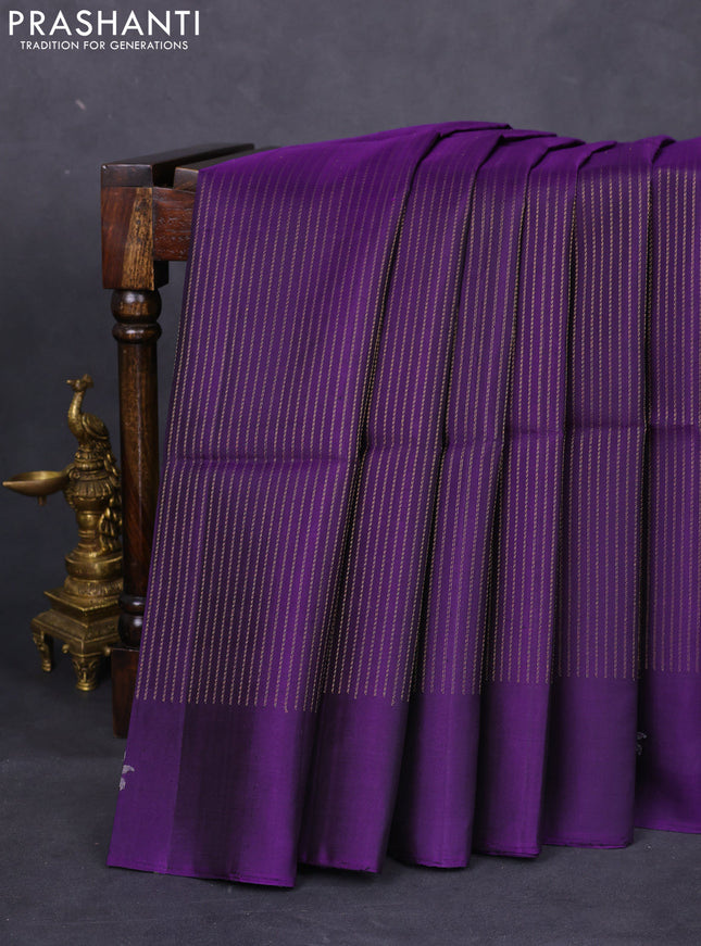 Pure soft silk saree violet with allover zari weaves and zari woven butta border