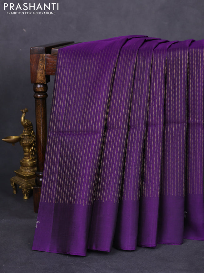Pure soft silk saree violet with allover zari weaves and zari woven butta border