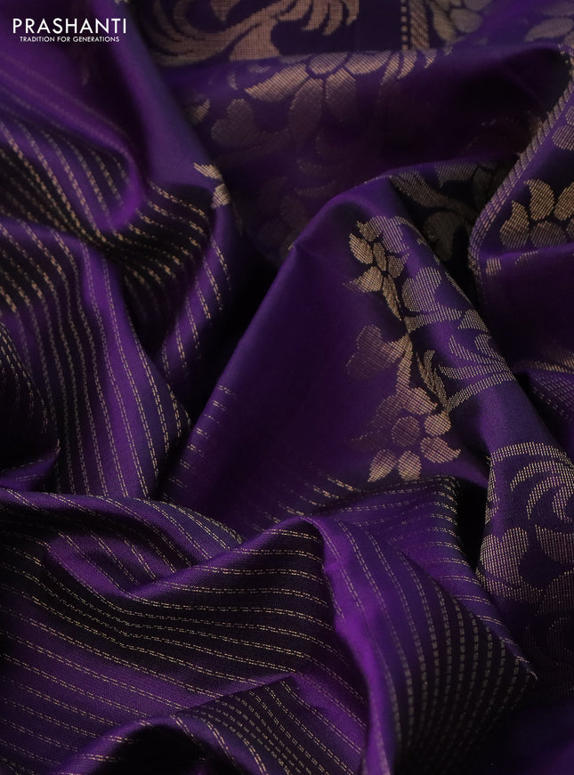 Pure soft silk saree violet with allover zari weaves and zari woven butta border