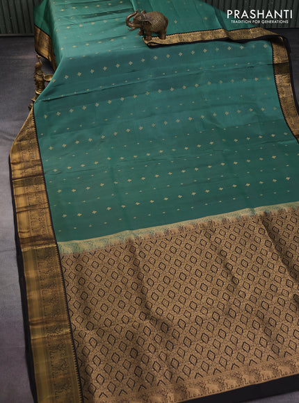 Pure soft silk saree pastel green and coffee brown with allover zari woven buttas and zari woven border