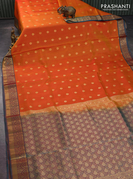 Pure soft silk saree sunset orange and dual shade of teal green with allover zari woven buttas and zari woven border