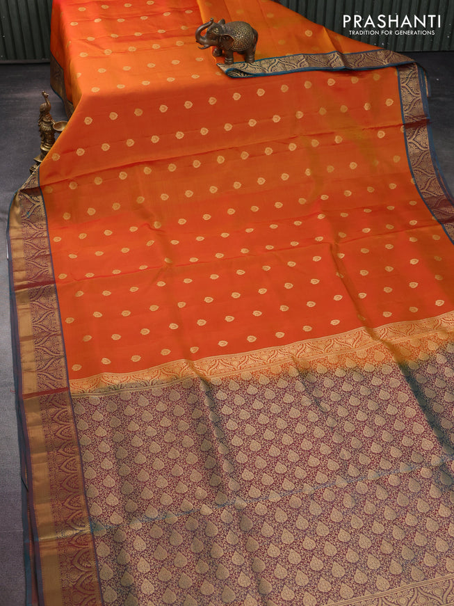 Pure soft silk saree sunset orange and dual shade of teal green with allover zari woven buttas and zari woven border