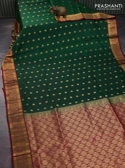 Pure soft silk saree green and maroon with allover zari woven buttas and zari woven border