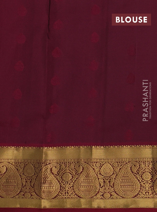 Pure soft silk saree green and maroon with allover zari woven buttas and zari woven border
