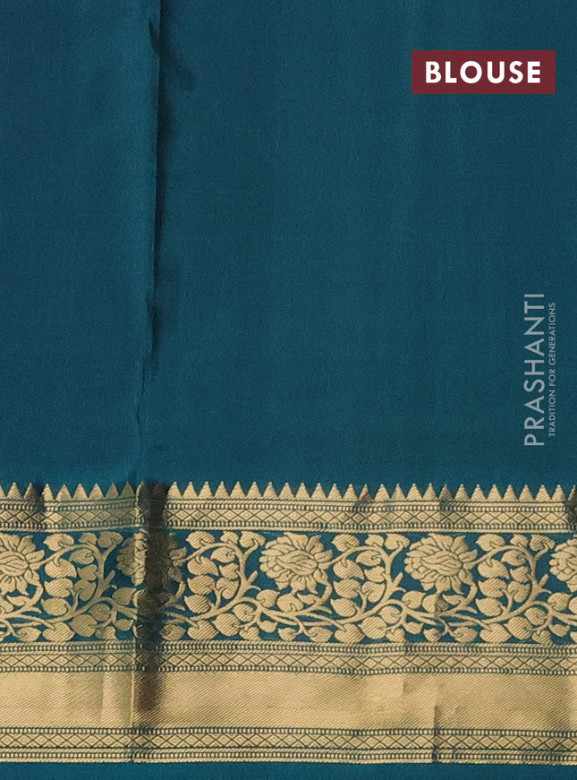 Pure soft silk saree purple and green with allover zari woven buttas and zari woven border