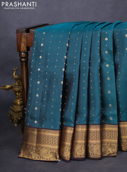 Pure soft silk saree peacock green and coffee brown with allover zari woven buttas and zari woven border
