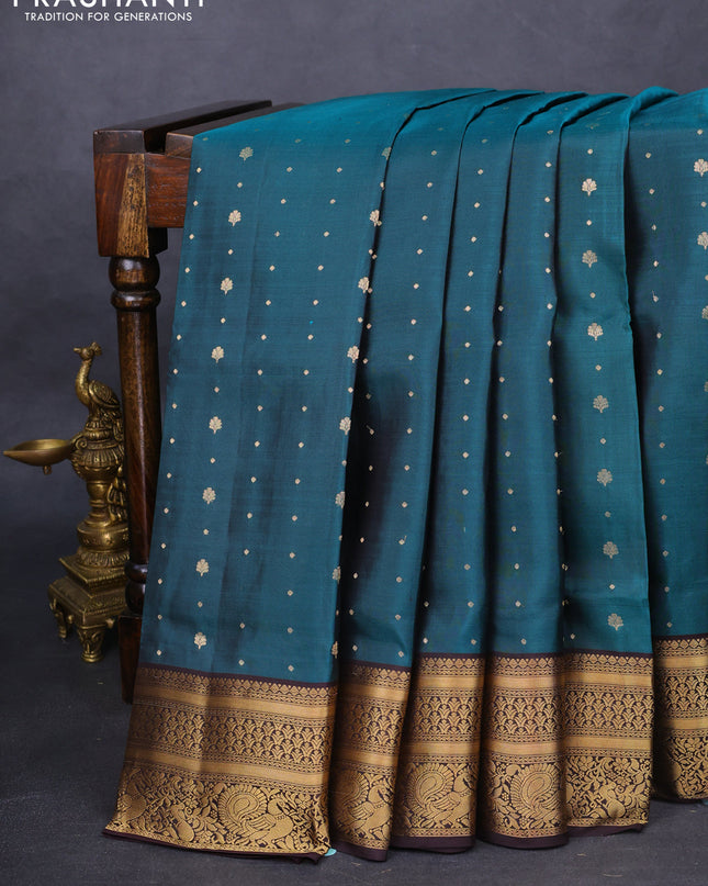 Pure soft silk saree peacock green and coffee brown with allover zari woven buttas and zari woven border