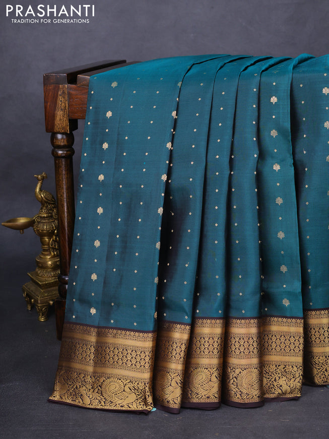 Pure soft silk saree peacock green and coffee brown with allover zari woven buttas and zari woven border
