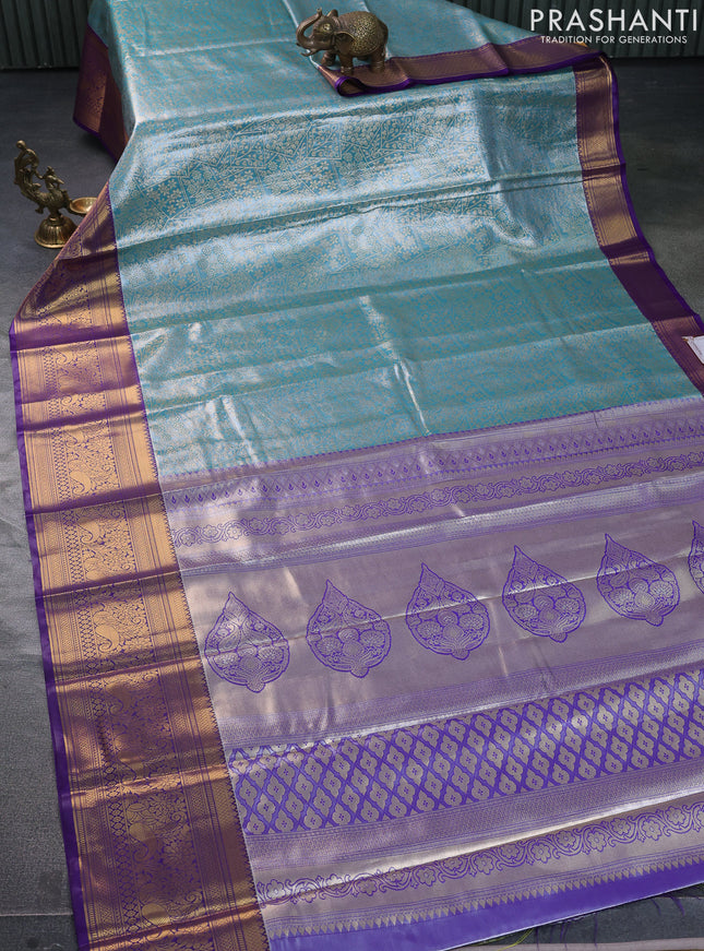 Bangalori tissue silk saree blue and violet with allover zari woven brocade weaves and long zari woven border