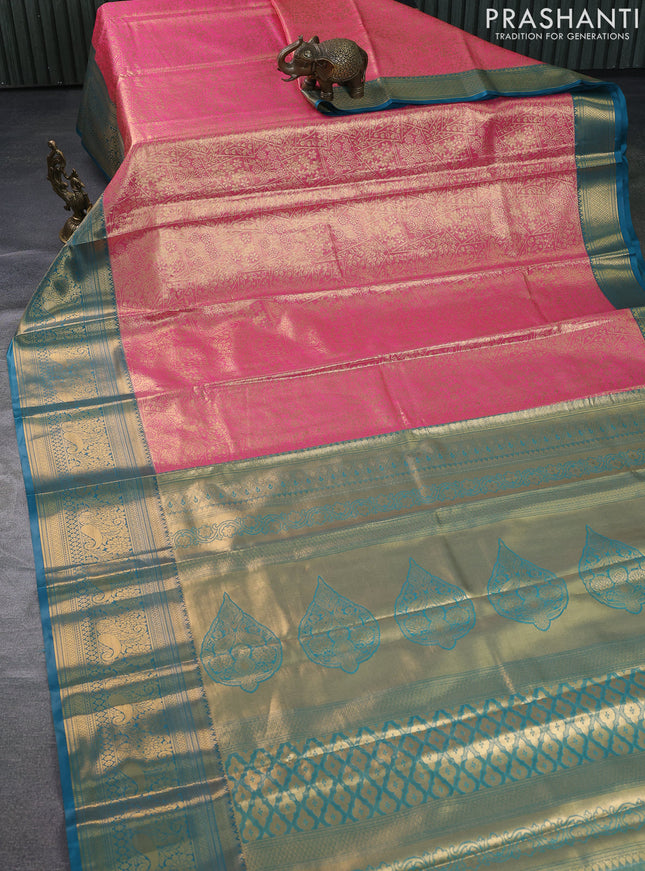 Bangalori tissue silk saree peach pink and teal green with allover zari woven brocade weaves and long zari woven border