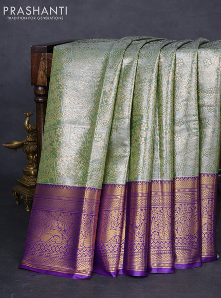 Bangalori tissue silk saree green shade and violet with allover zari woven brocade weaves and long zari woven border